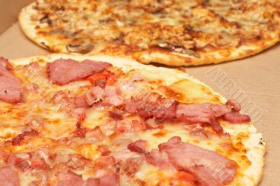 Tasty italian pizza with bacon and cheese