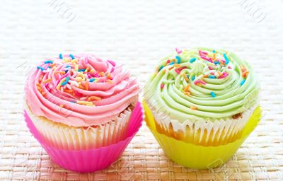 Vanilla cupcakes with strawberry and lime icing