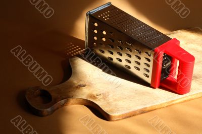 Grater On Cutting Board