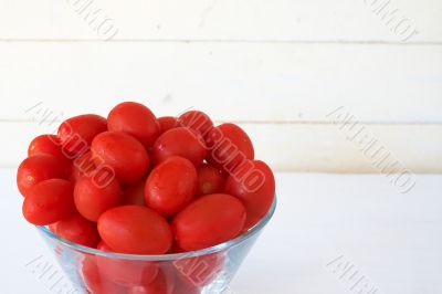 Baby rosa tomatoes on white