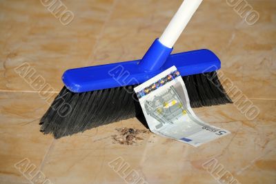Five Euro Banknote and a Broom