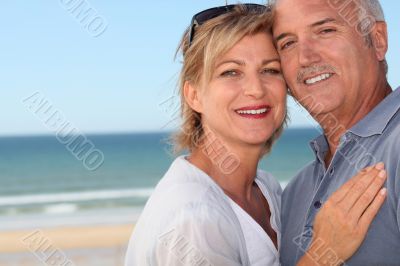 Happy couple at the beach
