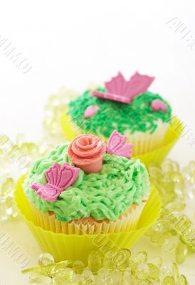 Vanilla cupcakes with various decorations