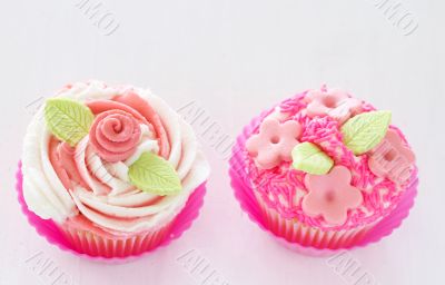 Vanilla cupcakes with flower decorations