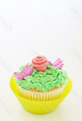 Vanilla cupcake with rose decorations
