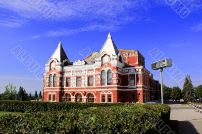 Landscape with historic theatre and blue sky