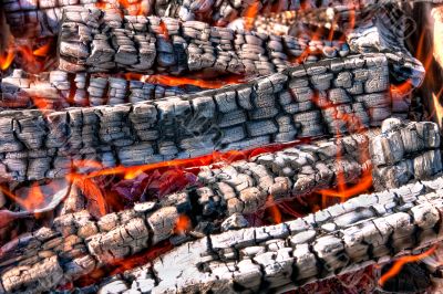 Closeup of a warm fire burning in a fireplace