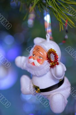 Toy Santa Claus on a Christmas tree