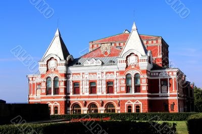 Landscape with historic theatre and blue sky