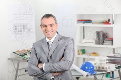 Smiling architect in office