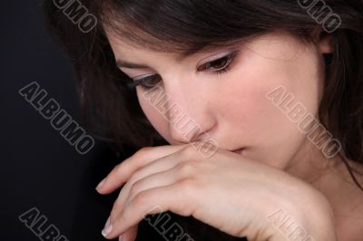 young woman thinking