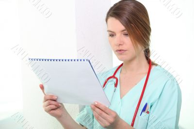 Nurse looking at calendar