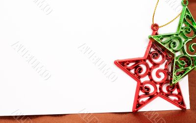 Two Christmas star decorations and card