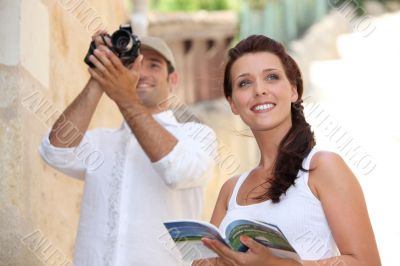 Tourists photographing monuments