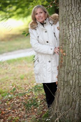 senior woman walking in the park