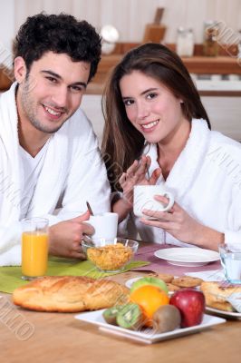 Couple eating breakfast