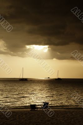 Drifting boat on a sunset