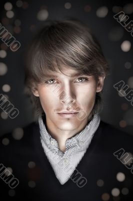 Portrait of young esquire man with smart and wise look. 