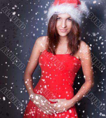 Portrait of beautiful young christmas woman posing.
