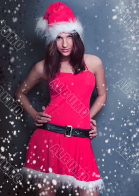 Portrait of beautiful young christmas woman posing