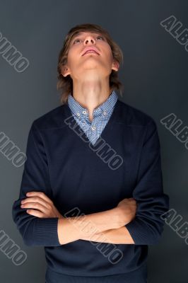 Portrait of a business man against grey background. Studio shot