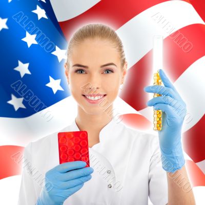 Portrait of female doctor or scientist showing and analyzing liq