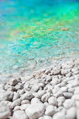 Soft wave of the sea on the pabble-stone beach