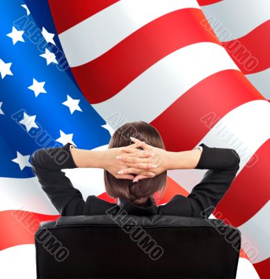 Closeup portrait of cute young business woman from behind sittin