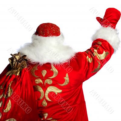 Santa Claus pointing his hand isolated over white. Photo from be