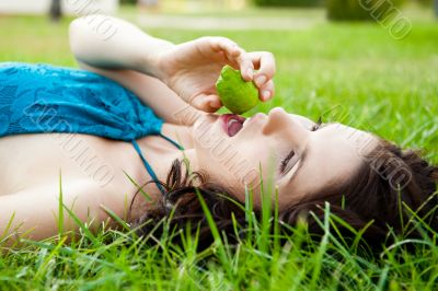 Pretty brunette girl wearing elegant dress relaxing outdoor in g