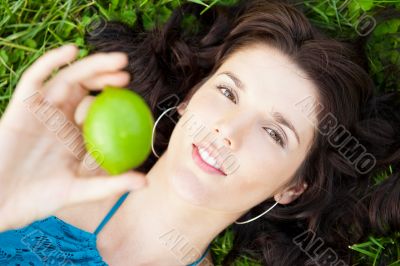 Pretty brunette girl wearing elegant dress relaxing outdoor in g