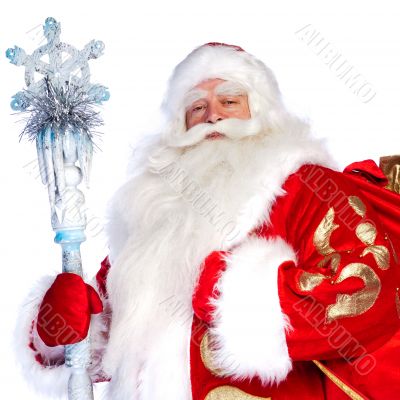 A traditional Christmas Santa Clause with staff isolated on whit