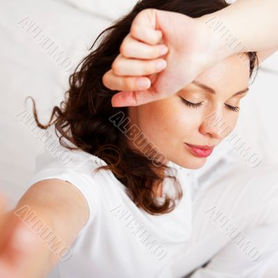 Portrait of a charming young lady relaxing on couch