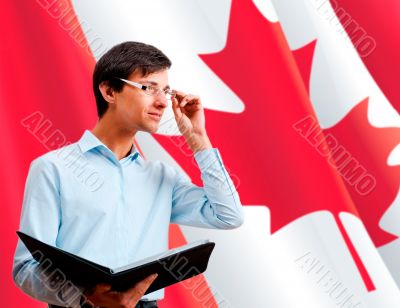 Portrait of adult man wearing formal clothes and glasses holding