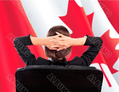 Closeup portrait of cute young business woman from behind sittin