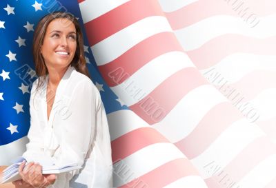 Portrait of pretty young woman holding book in her arms. USA Fla