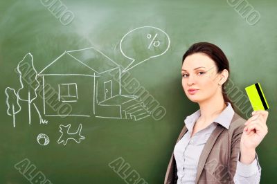 Closeup portrait of pretty young business woman against green bo