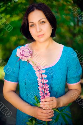 Artistic lifestyle photo of cheerful adult woman walking around 