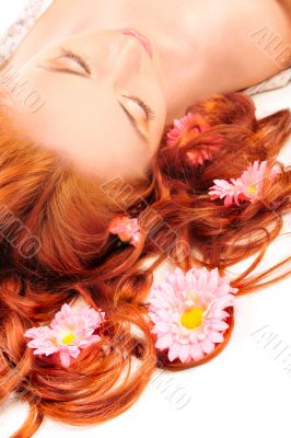 Closeup portrait of young beautiful caucasian woman with red hai