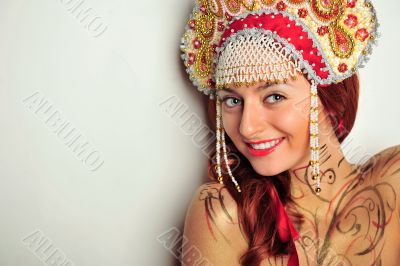 Closeup portrait of pretty young woman with red hairs