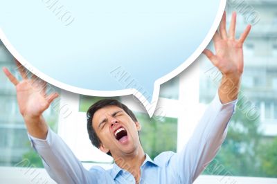 Businessman sitting indoors and writing plan in his diary