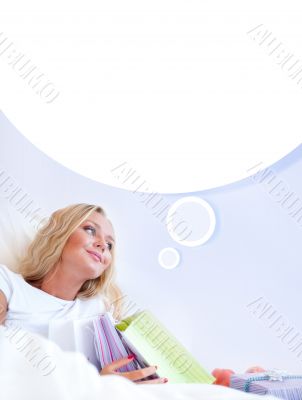 Young happy attractive girl unpack shopping bags in bedroom or h