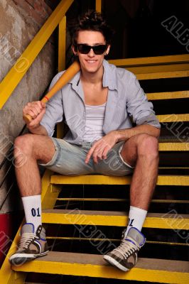 Closeup of young, handsome man thinking