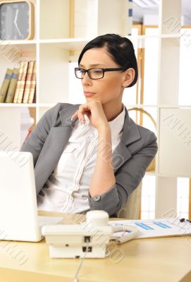 Portrait of a beautiful young businesswoman working.