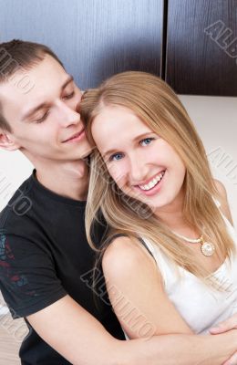 Portrait of a cute young couple enjoying themselves while prepar
