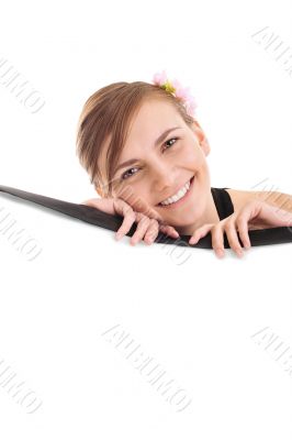 Portrait of a beautiful young woman behind a barrier