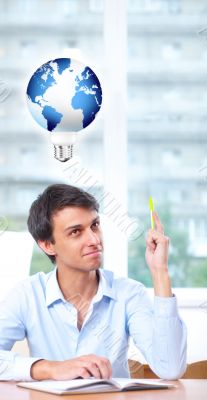 Closeup portrait of cute adult business man  with idea symbol ov