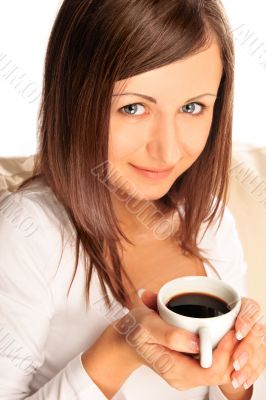 Closeup portrait of beautiful caucasian woman sitting on comfort