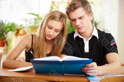 Portrait of a young group of students paying attention and doing