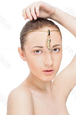 Portrait of a beautiful young woman with jewelery on her forehea